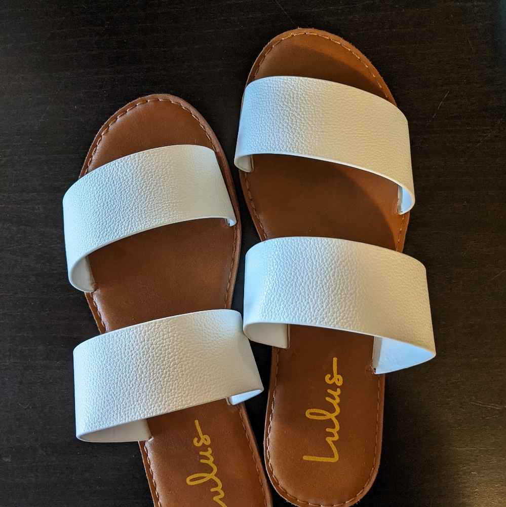 White pebbled slide sandals